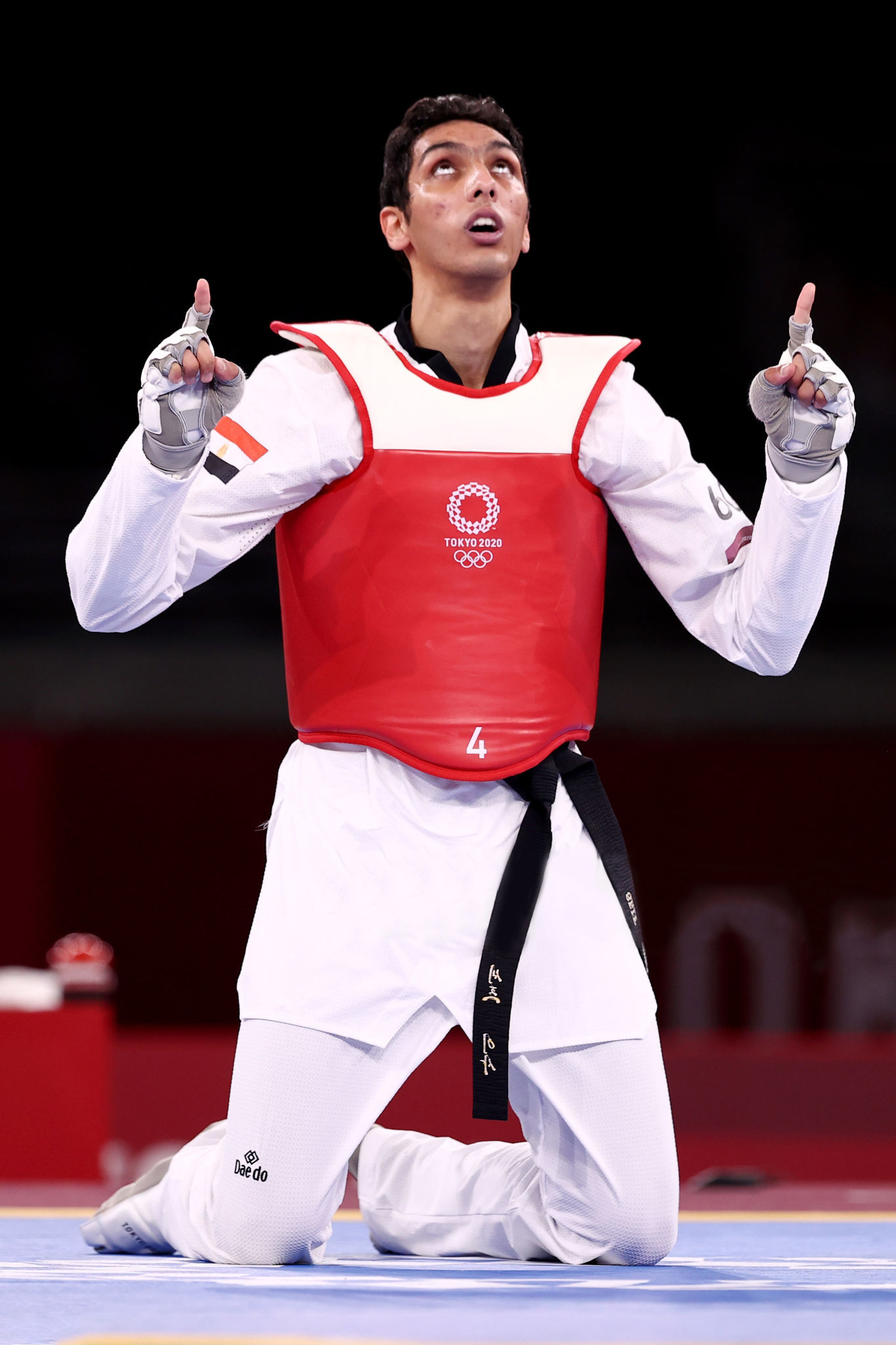 CHIBA, JAPAN - JULY 26: Seif Eissa of Team Egypt celebrates after defeating Simone Alessio of Team Italy during the Men's -80kg Taekwondo Quarterfinal contest on day three of the Tokyo 2020 Olympic Games at Makuhari Messe Hall on July 26, 2021 in Chiba, Japan. (Photo by Maja Hitij/Getty Images)